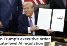 President Donald Trump displays his executive order countering state laws regulating AI. Alex Wong/Getty Images